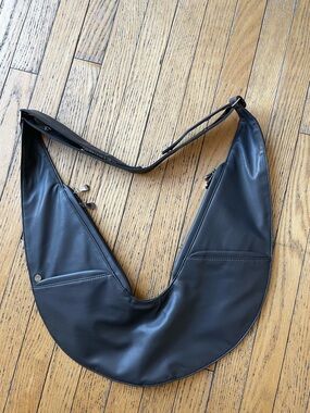 Sash Bag: “Vibranium” faux leather, standard size. Never used. NWOT.